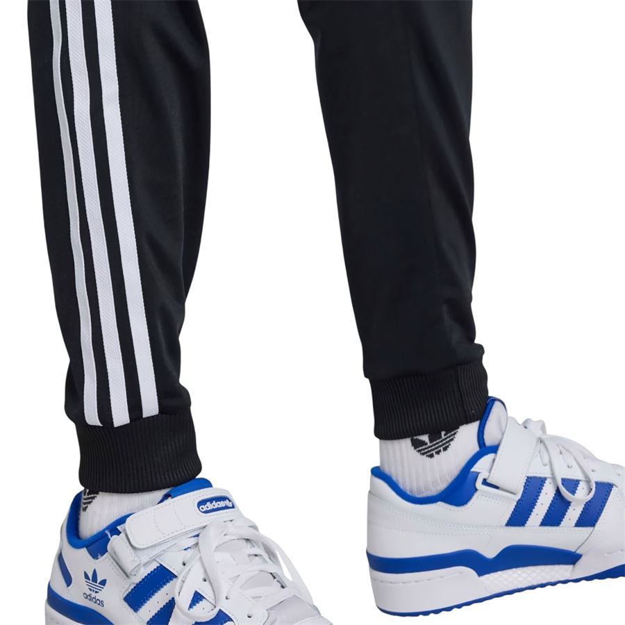 Track pants adicolor SST Junior pantaloni tuta da bambino Adidas | IX7630X